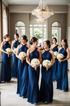 the bridesmaids are all dressed in blue