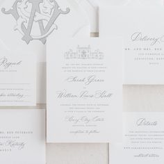 the wedding stationery is laid out on top of each other, including an envelope