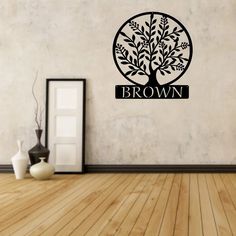 the brown tree logo is shown in this wall decal