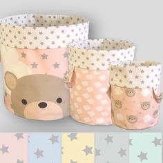 three little baskets with teddy bears and stars on them, one has a bear face