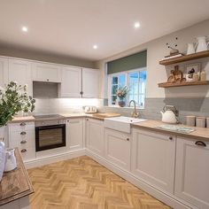 the kitchen is clean and ready for us to use in its new owner's home