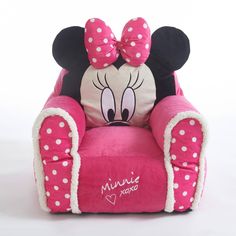 a minnie mouse chair that is pink with white polka dots