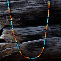 The Sahara Seed Bead Necklace is a single strand with multi colored seed beads. The necklace is a 16" in length with a 3" adjuster. Three Color Choices: Black, White, Turquoise Seed Bead Necklaces, Beaded Necklace Designs, Bead Necklaces, White Turquoise, Bead Bracelets, Seed Bead Necklace, Seed Bead Bracelets, Seed Bead Jewelry, Men's Rings