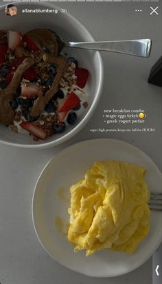 a bowl of fruit and yogurt next to a plate of food on a table