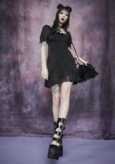 because you come from the fairy forest. Make magic in this chiffon babydoll dress with an empire waist, frilly sleeve and hem trim, satin bow details, puff sleeves., and a back zip closure Magpie Collection, Empire Waist Babydoll Dress, Chiffon Puff Sleeve, Chiffon Babydoll Dress, Punk Plaid, Occult Fashion, Mesh Overlay Dress, Fringe Kimono, Ribbon Dress