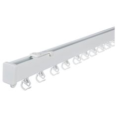 a white shelf with hooks and clips attached to it