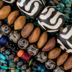 Which strand pops out to you the most? #TheBeadChest #EthicallySourced #Jewelry #Chic #AfricanBeads #StoneBeads #Turquoise #DIY #Boho #JewelryBlogger #EtsyShop #EtsyStore #BeadMaker #HealingStones #CrystalJewelry #HomeDecor #InteriorDesign #Designer #DIYDecor #UpcycledJewelry #RomanGlass #Handmade #HandmadeJewelry #Turquoise #PrayerBeads Artisan Fair Trade Beaded Bracelets With Round Beads, Traditional Wooden Beads In Natural Color, Traditional Natural Wooden Beads, Artisan Natural Handmade Beads, Handmade Bohemian Bone Beaded Necklaces, Artisan Oval Wooden Beads, Cow Bones, Diy Boho, Roman Glass