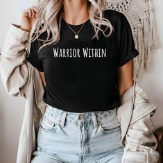 🌟 Welcome to Comzy Closet! 🌟 Do you like this "Warrior Within" t-shirt?  We are working hard, to get the best tees in town for YOU! Support our small business and buy our cozy t-shirts! You won't regret!  Step into a world of your unique style add a touch of individuality to your wardrobe with our collection of custom design printed tees!  🎨 Express Yourself: From vibrant graphics to intricate patterns, our designs are crafted to ignite your imagination and make a statement wherever you go. ? Casual Letter Print Yoga Top, Casual Letter Print Top For Yoga, Casual Yoga Tops With Letter Print, Casual Crew Neck T-shirt For Yoga, Black Letter Print Top For Yoga, Yoga Tops With Letter Print And Crew Neck, Crew Neck Yoga Tops With Letter Print, Yoga Crew Neck Tops With Graphic Print, Graphic Print Crew Neck Top For Yoga