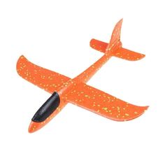 an orange toy airplane flying through the air