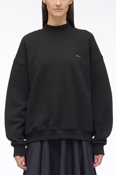 Compact French Terry Sweatshirt-black #1 Streetwear Funnel Neck Sweater With Ribbed Cuffs, Funnel Neck Sweater With Ribbed Cuffs For Streetwear, Streetwear Turtleneck Sweatshirt With Ribbed Cuffs, Sporty Turtleneck Sweatshirt With Ribbed Cuffs, Sporty Turtleneck Sweatshirt With Ribbed Collar, Streetwear Funnel Neck Sweatshirt With Ribbed Collar, Turtleneck Sweatshirt With Relaxed Fit For Layering, Relaxed Fit Turtleneck Sweatshirt For Layering, Classic Oversized Sweatshirt With Ribbed Cuffs