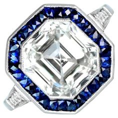 an art deco diamond and blue sapphire ring