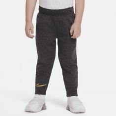 The Nike Dri-FIT Doodle Pants feature illustrative Swoosh and Nike logos and has moisture-wicking technology to help keep kids cool and comfy at play. Nike Logos, Pants Black, Nike Logo, Nike Dri Fit, Toddler Boys, Dri Fit, Black Pants, Moisture Wicking, Sweatpants