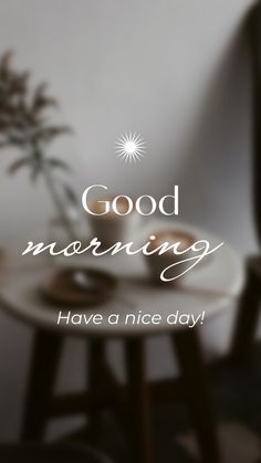 the words good morning have a nice day are displayed in front of a table with two plates on it