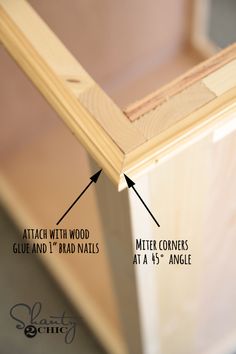 the corner of a wooden cabinet with measurements for the top and bottom corners, including an angle