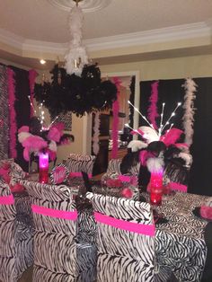 a room with zebra print and pink decorations