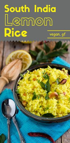 a bowl filled with lemon rice on top of a blue cloth next to spoons