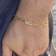 Paperclip link chain 4mm bracelet. 14k gold plated over 925 silver. Choose 6.5", 7", 7.5", 8" , 8.5" inch. Weigh 4-5 grams depending on size. Real 925 sterling silver wrist piece. Handmade bracelet is made in Italy. Stamped 925 Italy on the lobster lock. Will never turn your wrist green. FREE SHIPPING in USA. Order now! Adjustable 14k Gold Jewelry With Paperclip Chain, Gold Sterling Silver Box Chain Bracelet, Yellow Gold Sterling Silver Link Chain Bracelet, Gold Sterling Silver Jewelry With Rectangular Links, Elegant Gold Sterling Silver Paperclip Bracelet, Modern Gold Paperclip Jewelry, Gold Plated Paperclip Bracelet With Lobster Clasp As Gift, Gold Sterling Silver Link Paperclip Bracelet, 14k Gold Paperclip Chain Bracelet Gift