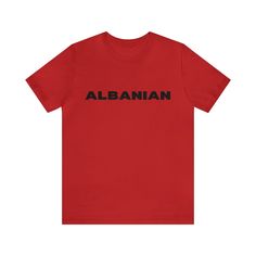 Albanian in the front and the Eagle on the back. This classic unisex jersey short sleeve tee fits like a well-loved favorite. Soft cotton and quality print make users fall in love with it over and over again. These t-shirts have-ribbed knit collars to bolster shaping. The shoulders are tapered for a better fit over time. Dual side seams hold the garment's shape for longer.  .: Made with 100% Airlume combed and ring-spun cotton, a lightweight fabric (4.2 oz/yd² (142 g/m that is easy to layer, breathable. Perfect for active and leisure wear.  .: The retail fit that is perfect for casual and semi-formal settings. The crew neckline adds a classic, neat style that's perfect for accessorizing. .: Bella+Canvas manufactures all its products in the US and internationally in humane, no-sweat-shop, s Albanian Eagle, The Eagle, Leisure Wear, Jersey Shorts, Lightweight Fabric, Fall In Love, Print Making, Short Sleeve Tee, Ribbed Knit