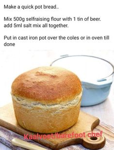 a loaf of bread sitting on top of a cutting board