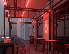 an empty restaurant with red chairs and neon lights