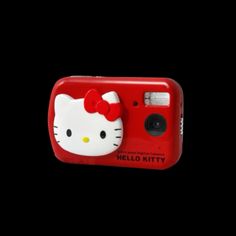 a red camera with a hello kitty on it