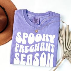 IT IS PAST THE ORDER DEADLINE TO GUARANTEE A CHRISTMAS DELIVERY!   Please allow at least a 10 day timeframe to receive orders for any specific date/event   *Image files not for sell* The perfect spooky season pregnancy t-shirt! COMFORT COLORS 1717 UNISEX SHIRT One of the most popular t-shirts on the market.  Extremely soft and 100% ring-spun cotton The fabric has been meticulously garment-dyed using the signature Comfort Colors process, resulting in rich, vibrant colors that are designed to fade Halloween Pregnancy Shirt, Pregnant Halloween, Fall Maternity, Maternity Shirt, Comfort Colors Shirt, Baby Reveal, Pregnancy Shirts, Flat Surface, Spooky Season