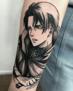 a man's arm with an anime character tattoo on it