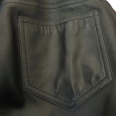 Experience the timeless sophistication of GALLIANO leather pants. Crafted from luxurious black leather with intricate embroidered trim, these pants make a statement fit for any occasion. This exclusive piece is sure to elevate any wardrobe with its subtle elegance. US size 6. If you have an inquiry or specific questions for this archive piece: Please send us a chat on our website or send an email to info@theremoda.com We are happy to assist in the best way possible! How you can pay for your arch Luxury Leather Trousers, Luxury Black Leather Bottoms, Luxury Black Leather Pants For Work, Luxury Black Straight Leg Pants, Luxury Black Leather Pants, Luxury Black Bottoms With Pockets, Classic Black Straight Leather Pants, Elegant Black Leather Pants With Pockets, Luxury Leather Pants