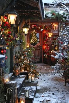 an outdoor christmas scene with lit candles and decorations