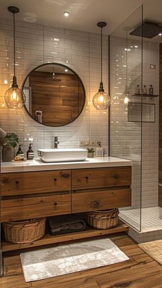 a bathroom with a sink, mirror and shower stall in the middle of the room