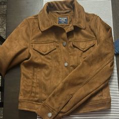 Brown Abercrombie & Fitch Suede Jacket Never Worn Size Small Classic Brown Cropped Long Sleeve Jacket, Classic Brown Long Sleeve Cropped Jacket, Classic Long Sleeve Brown Cropped Jacket, Classic Brown Cropped Jacket For Fall, Abercrombie And Fitch, Abercrombie & Fitch, Suede Jacket, Abercrombie Fitch, Jackets For Women