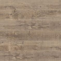 a close up view of the wood grain pattern on this flooring material, which is very light brown