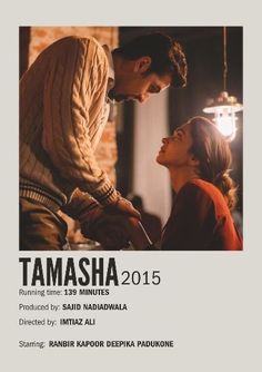 a man and woman standing next to each other in front of a poster for the film tamasha