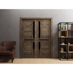 a living room with a chair and book shelf next to a door that is open