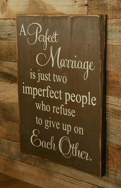 a sign that says perfect marriage is just two imperfect people who refuse to give up on each other