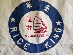 a bag with the words rice king written in red and blue on it's side