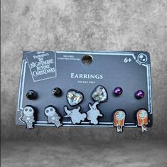 the earring set is designed to look like disney's halloween movies, and features an assortment of cartoon characters