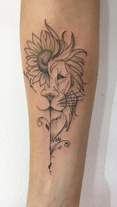 a woman's leg with a sunflower and lion tattoo on the side of it