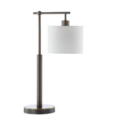 a table lamp with a white shade on it's side and a black base