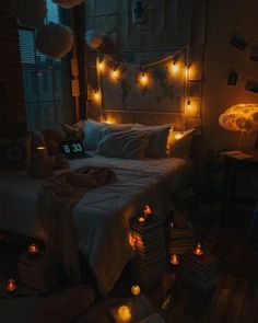 a bed with lots of lights on the headboard and night time decorations above it