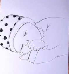 a drawing of a sleeping baby with black hearts on it's head and arms