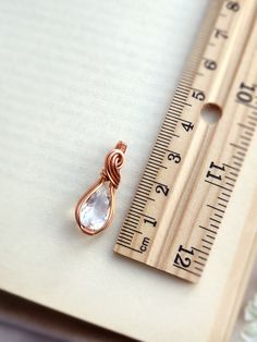 ✨ One-of-a-kind item ✨ You will get the exact pendant as seen in the photos. • This lovely pendant is handmade with a natural clear quartz faceted gemstone. The metal part is solid copper. • Small and elegant design. It is delicately wire wrapped in solid copper, which adds a rustic charm to the piece. SIZING • Pendant size : H 3 x W 1 cm 🎁 This pendant will come with a free 18" copper necklace. A different length can be requested if needed :) CARE INSTRUCTION • After each wear, gently clean th Copper Necklace, Quartz Pendant, Soapy Water, Faceted Gemstones, Safe Place, Wire Wrapped Pendant, Polish Jewelry, Necklace Sizes, Deep Cleaning