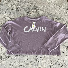 New With Tags! Msrp $49.50 Calvin Klein Performance “Calvin” Cropped Tee - Long Sleeve Lavender Color 60% Cotton / 40% Modal Calvin Klein Modern Relaxed Fit Tops, Calvin Klein Jeans Women, White Long Sleeve Top, Black Long Sleeve Shirt, Long Sleeve Striped Top, Lace Top Long Sleeve, Tie Dye Long Sleeve, Calvin Klein Women, Cropped Tee