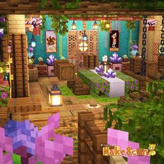 an image of a living room that is decorated in minecraft with purple flowers and greenery