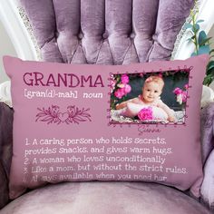 a purple chair with a pink pillow on it that says grandma grand - man down