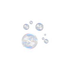 soap bubbles floating in the air on a white background