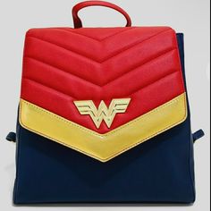 Questions? Leave A Comment Below! Retro Style Standard Backpack, Retro Standard Backpack, Trendy School Bags With Case Included, Wonder Woman Tattoo, Comic Bag, Woman Tattoo, Woman Logo, Wonder Woman Logo, Italian Leather Bags