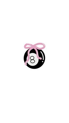 a black and white ball with a pink ribbon around it's neck, on a white background