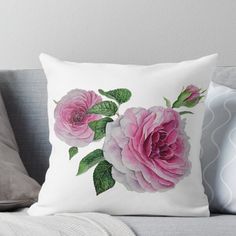 two pink roses with green leaves on a white background throw pillow