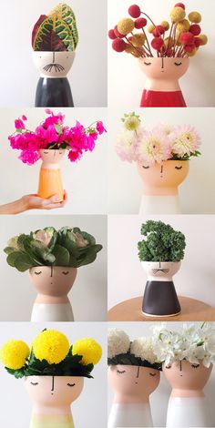 six different vases with flowers in them on a wooden table and one is holding a plant